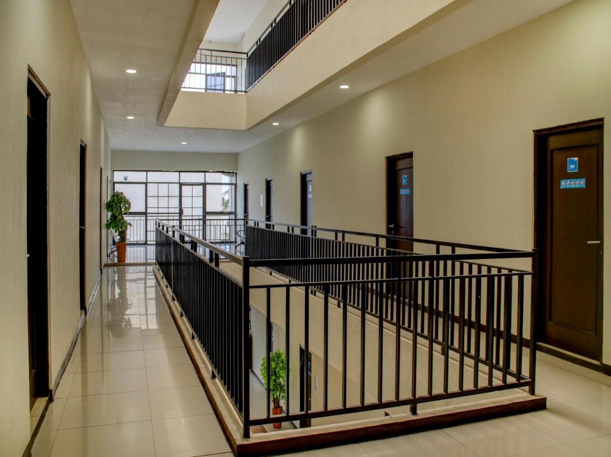 Oyo 90162 Remboelan Guest House Sungai Lutus 外观 照片