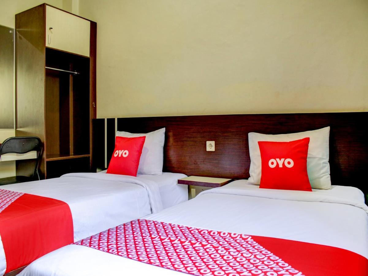 Oyo 90162 Remboelan Guest House Sungai Lutus 外观 照片