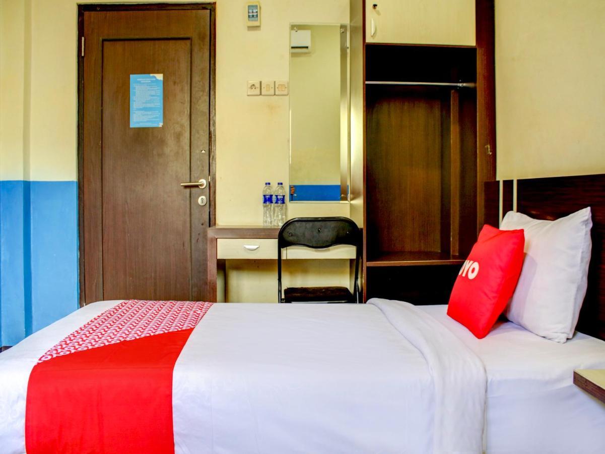 Oyo 90162 Remboelan Guest House Sungai Lutus 外观 照片