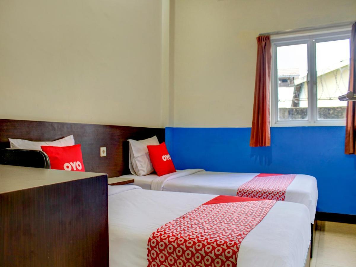 Oyo 90162 Remboelan Guest House Sungai Lutus 外观 照片