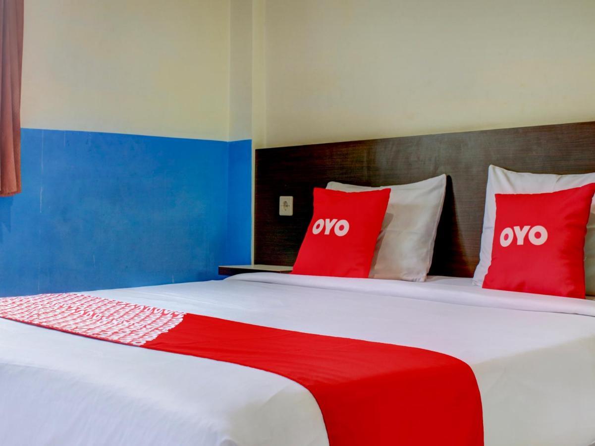 Oyo 90162 Remboelan Guest House Sungai Lutus 外观 照片