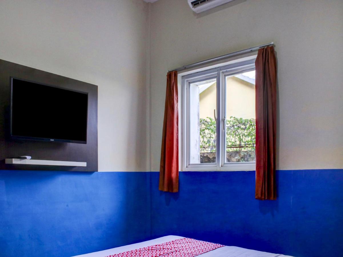 Oyo 90162 Remboelan Guest House Sungai Lutus 外观 照片