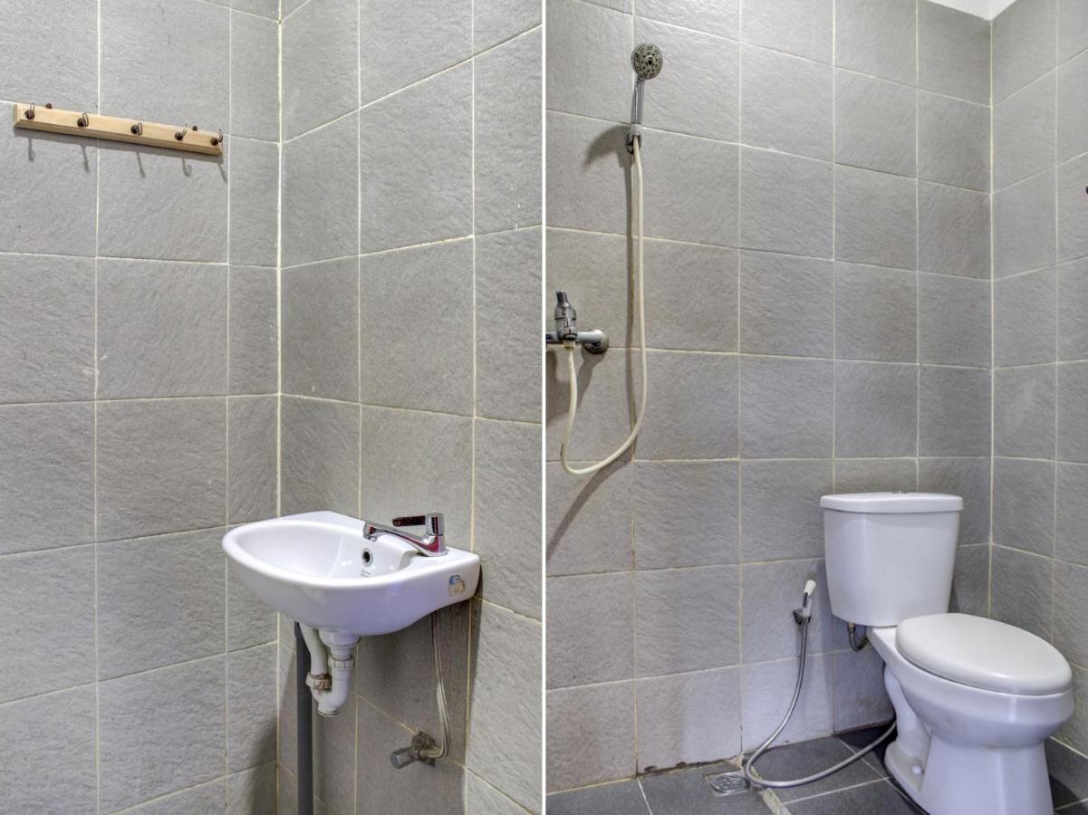 Oyo 90162 Remboelan Guest House Sungai Lutus 外观 照片