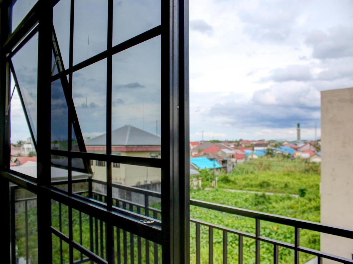 Oyo 90162 Remboelan Guest House Sungai Lutus 外观 照片